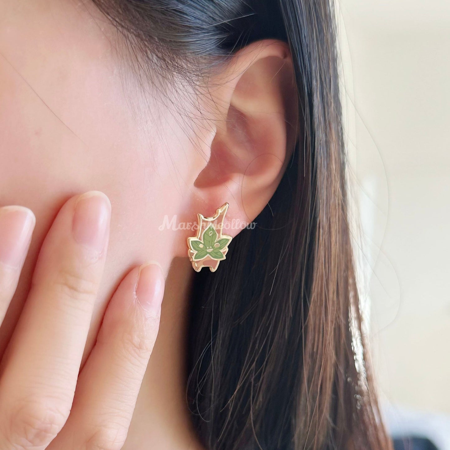 wearing  korok earrings 